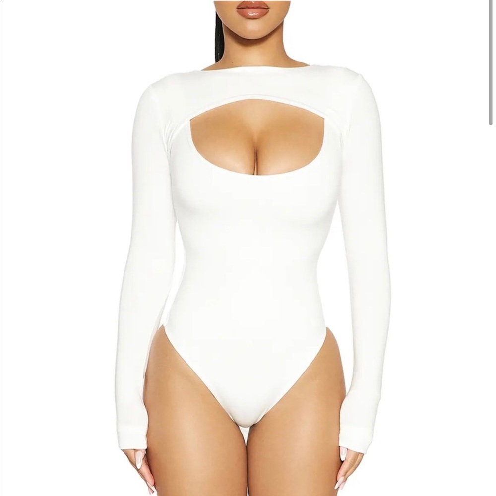 NWT Naked wardrobe front cutout long sleeve bodysuit. New with a tag. Pink